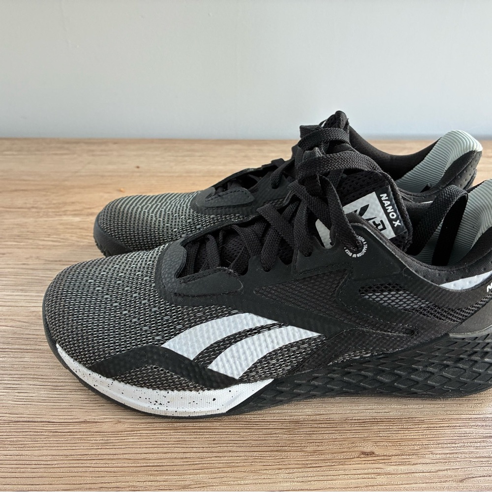 Reebok women’s Black and White Athletic Shoes